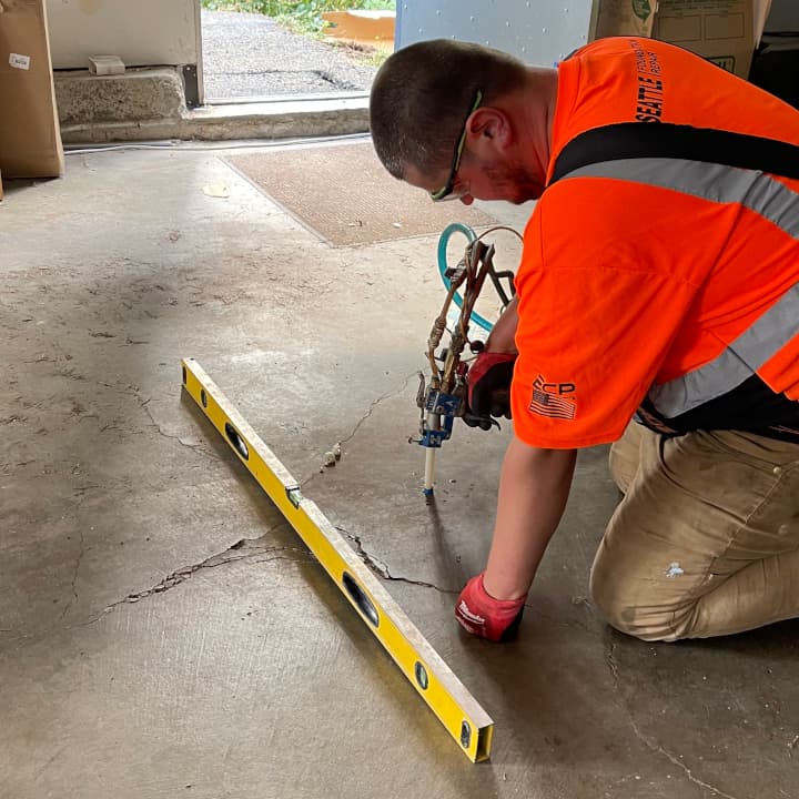Fixing cracks in a concrete garage floor
