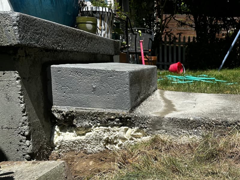 Lifted concrete step with polyurethane foam injection — fast level restoration.